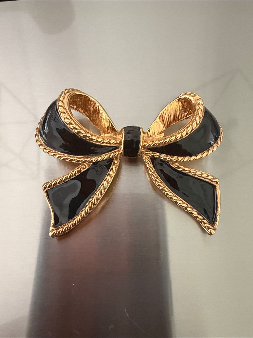 Avon by KJL Gold and Black Bow Pin - Elegant Women’s Jewelry